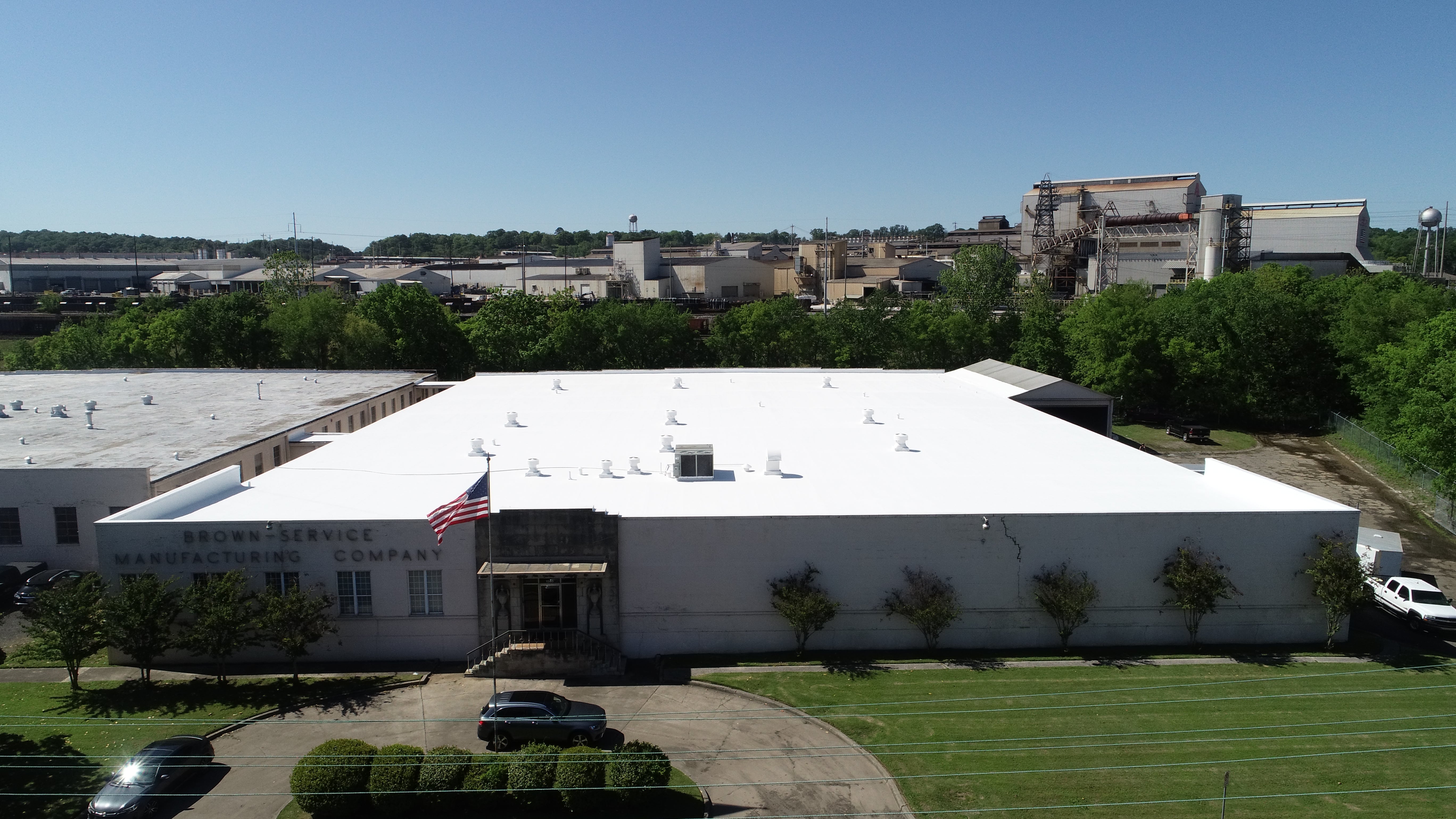 Completed fabric reinforced roofing project by Falcon Roofing Systems showcasing premium roofing technology with long-term warranty coverage