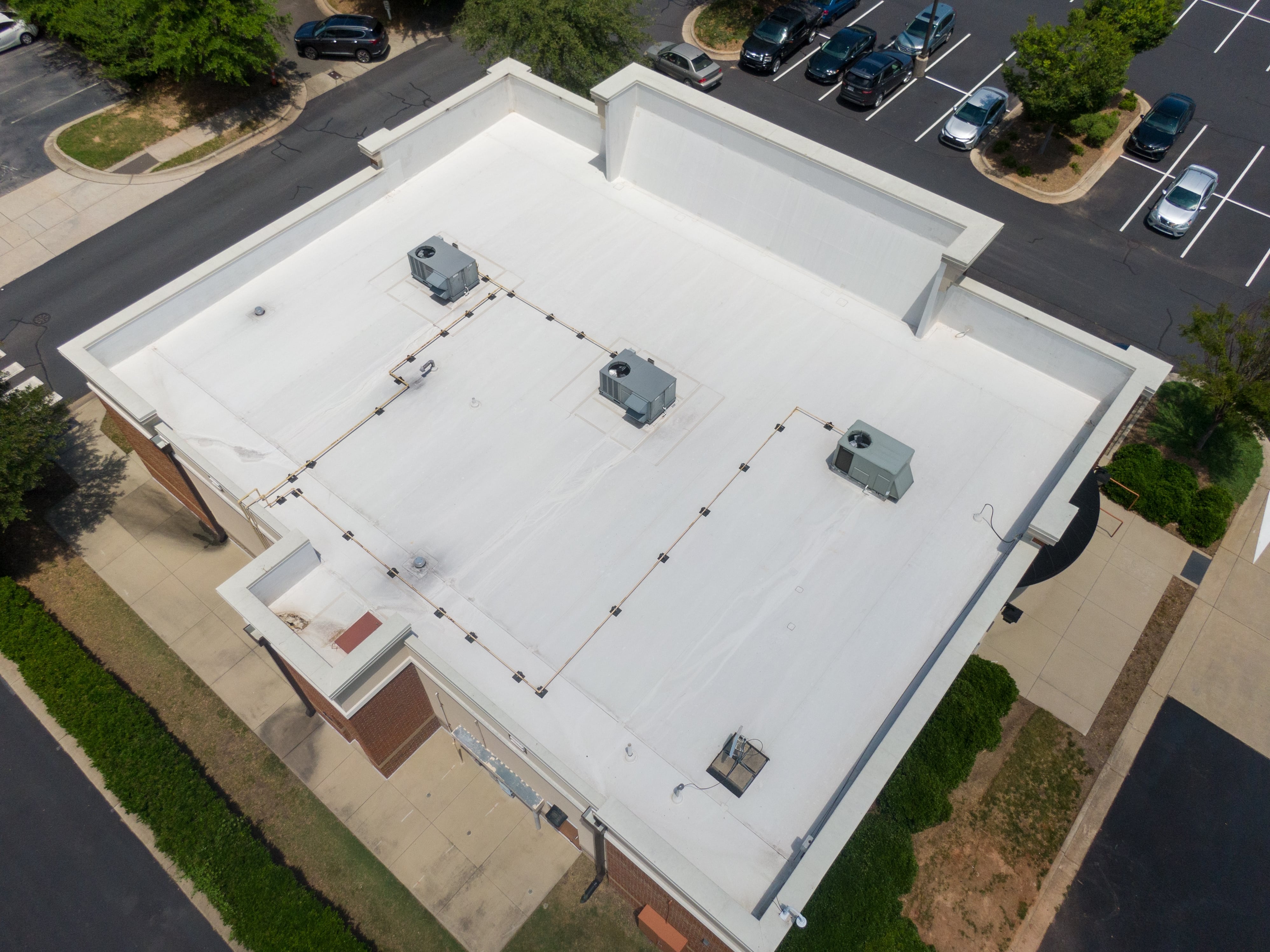 Professional TPO single-ply membrane installation by certified roofing contractors demonstrating expert techniques for long-lasting commercial roof protection